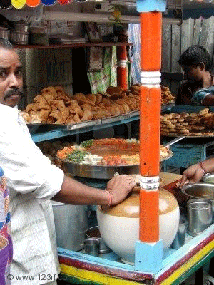 Fast Food indien, http://fr.123rf.com/photo_7960667_hyderabad-inde--21-nov--pr-paration-du-d-jeuner-de-fast-food-indien-de-dal-et-vegetableson-21-novemb.html